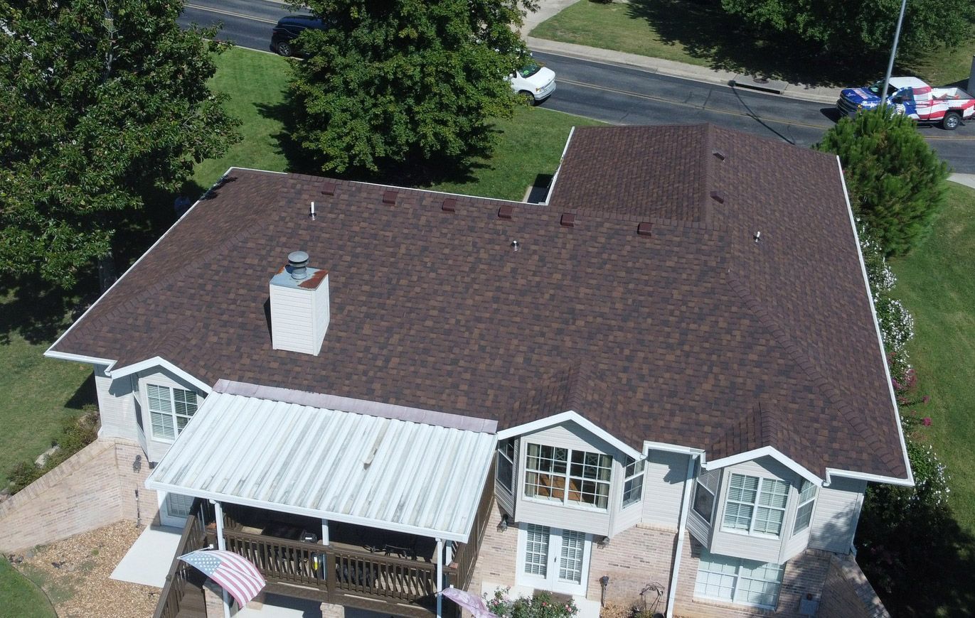 Aerial view of a completed ARCC shingle roof in Southwest Missouri